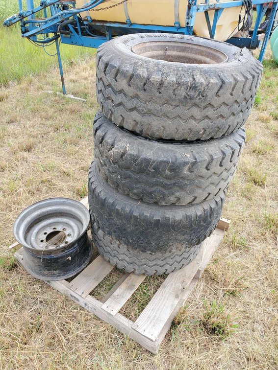 (I-77A) (4) SUMMIT 12-16.5 TIRES W/8 BOLT RIMS AND ONE 8 BOLT RIM