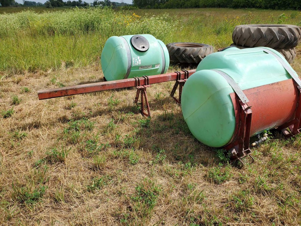 (I-79A) (2) POLY SPRAYER TANKS W/MOUNTING BAR