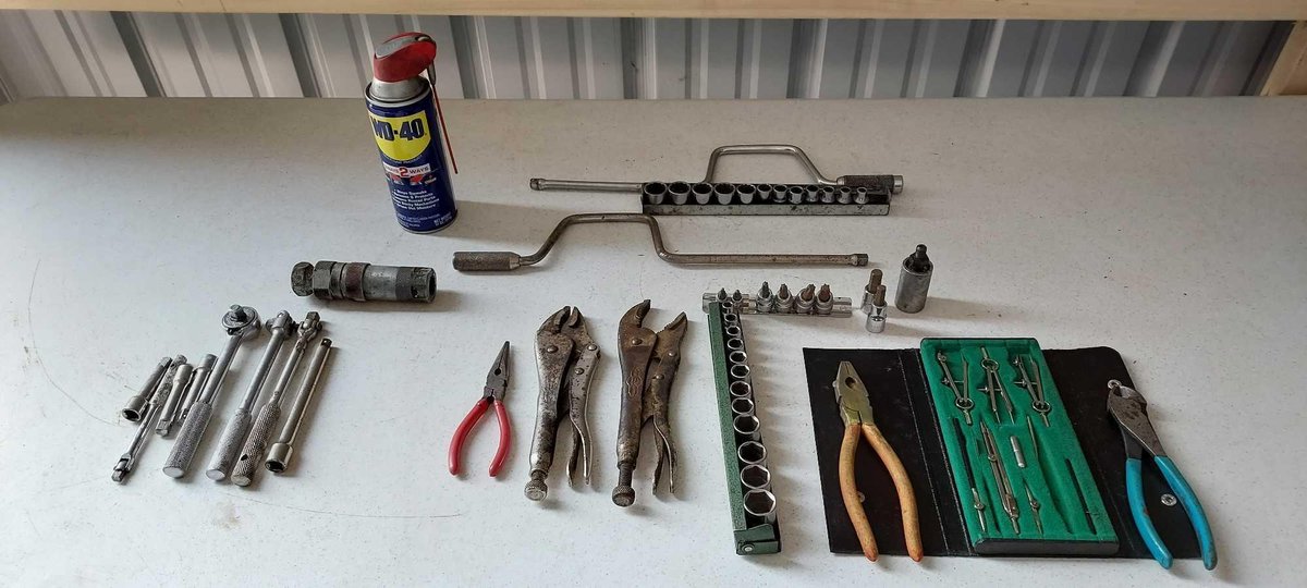 ASSORTMENT OF SOCKETS, PLIERS, WD40, MISC