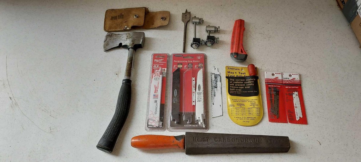 ASSORTMENT OF SAWS ALL BLADES, HATCHET, AND MISC