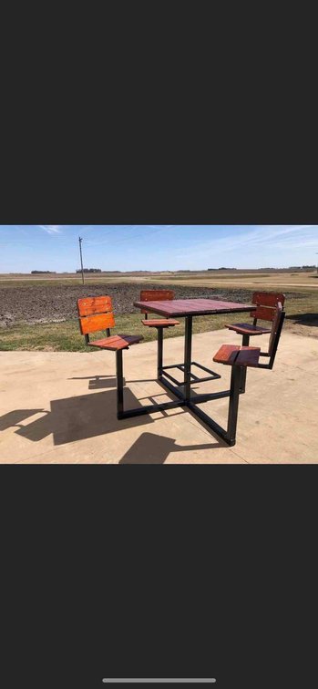 Handcrafted 4 person table donated by Gary Olson
