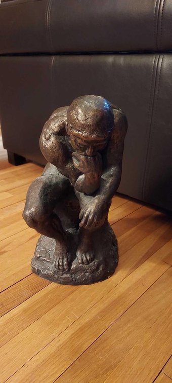 METAL SCULPTURE OF THINKING MAN