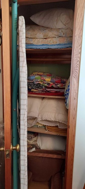 ASSORTMENT OF BLANKETS/QUILTS, IRONING BOARD, AND OTHER MISC