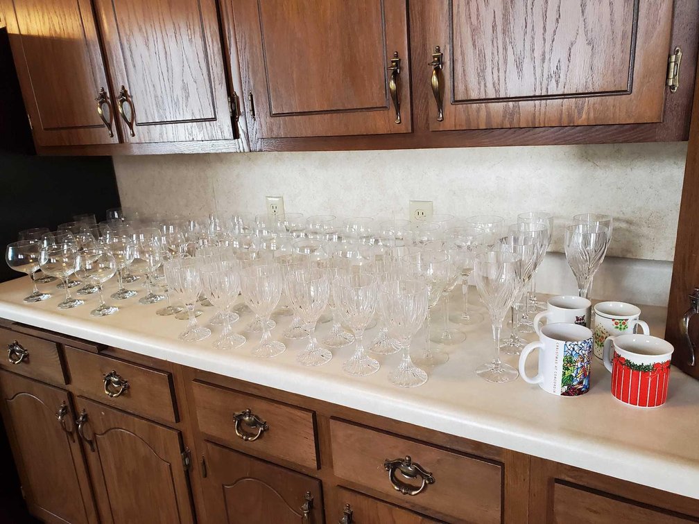 LARGE ASSORTMENT OF STEMWARE, COFFEE CUPS, AND MORE