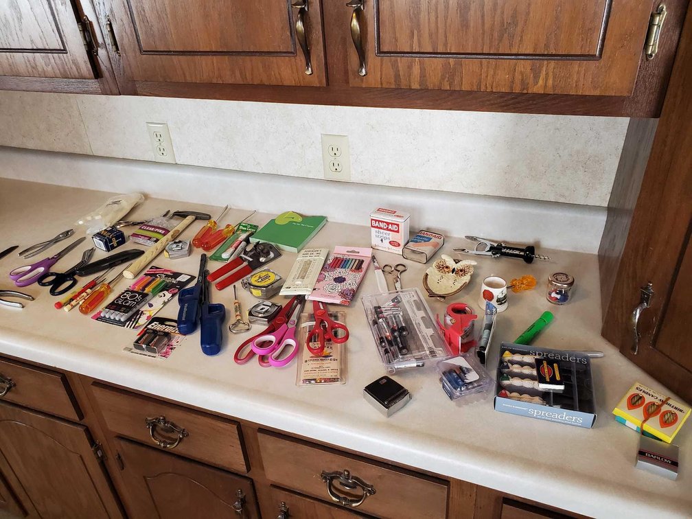 BATTERIES, LIGHTERS, COLORED PENCILS, AND MISC ITEMS