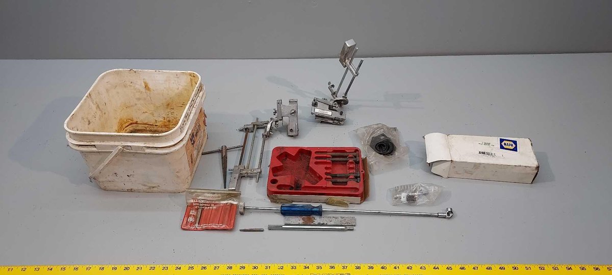 (I-59) ENGINE TOOLS AND A CHAIN SAW SHARPENER