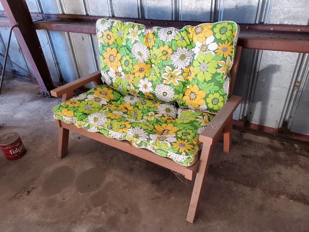 PATIO LOVE SEAT W/CUSHION (FOR MORE INFO AND LOCATION CALL ROD AT 320-424-1601)
