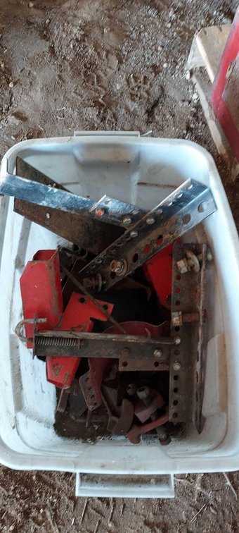 TOTE OF MISC. IMPLEMENT PARTS