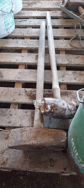 (2) SLEDGEHAMMERS, HAMMER HEADS, BOLTS, AND A BUCKET OF MORE