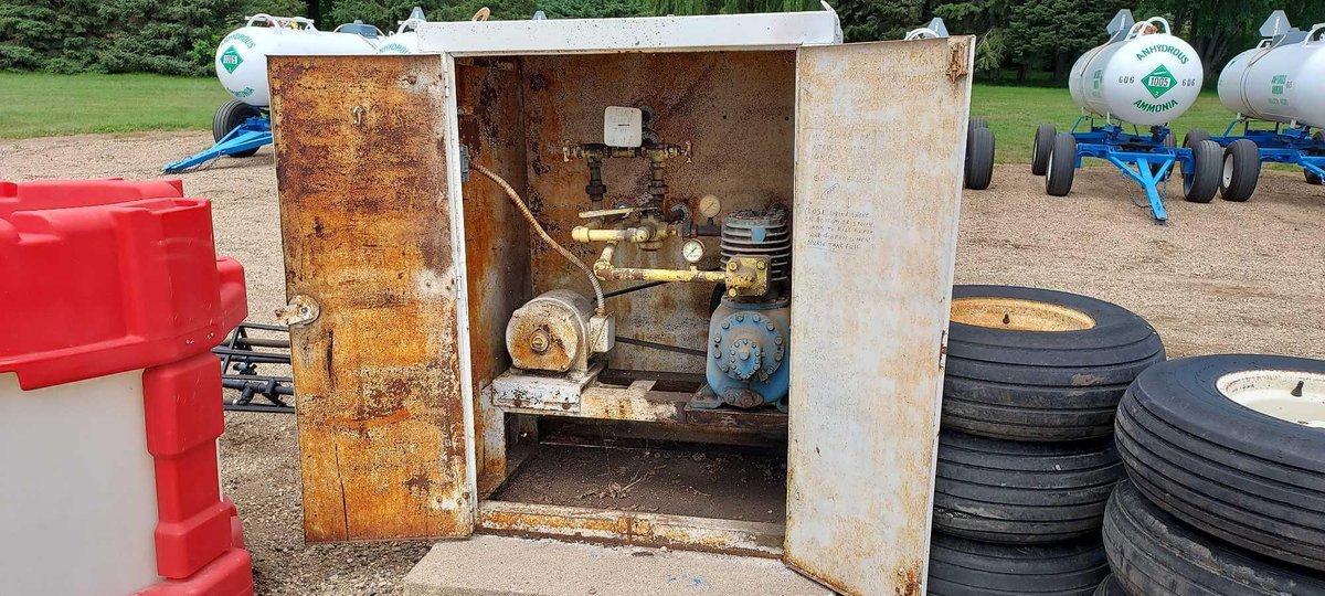 (C-8) THERMATORL AIR COMPRESSOR IN CABINET, ON CEMENT SLAB, OPTIONS TO USE FOR VACUUM OR PUSHING AIR