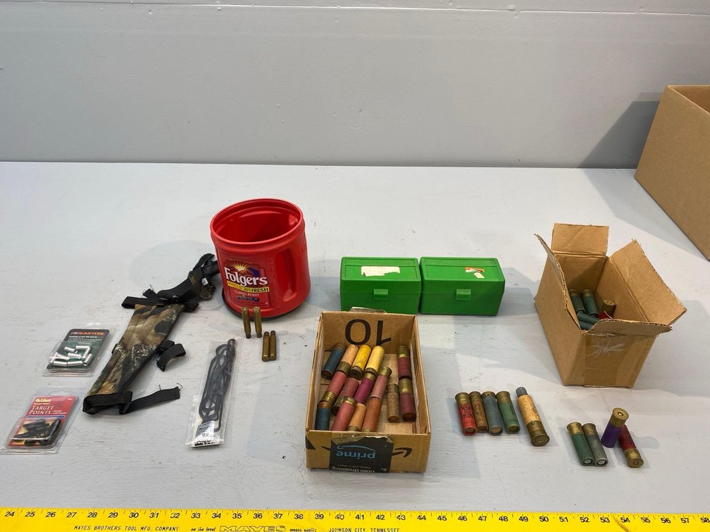 (I-38) [2] EMPTY PLASTIC AMMO BOXES, MISC 16 GA SLUGS, 12, 16, 20 GA PAPER SHELLS, AND EMPTY 30-06 BRASS, MISC BOW ACCESSORIES 