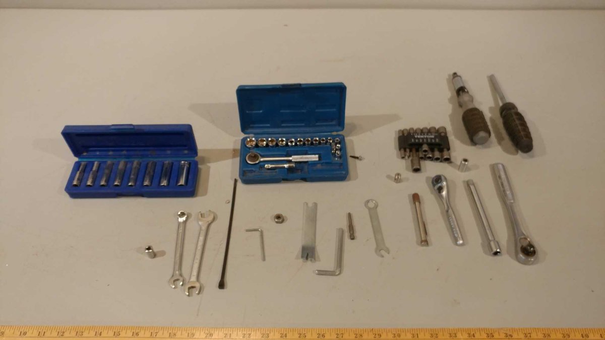 ASSORTMENT OF SOCKET WRENCHES, SOCKETS, AND OTHER MISC ITEMS