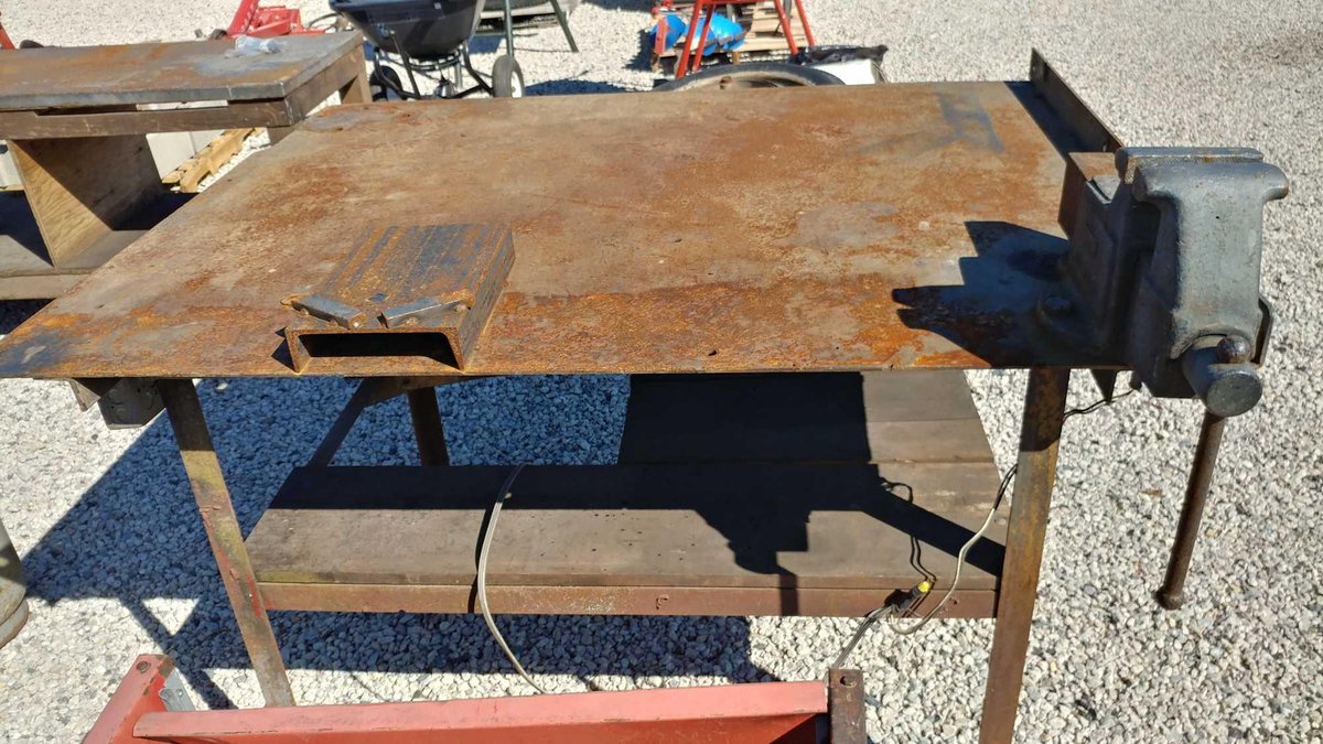 WELDING TABLE W/BENCH VISE, LOWER SHELF, AND CASTERS (60"W X 40"H X 48"D)