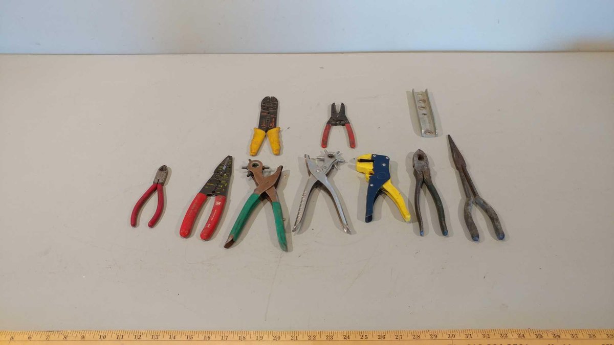 ASSORTMENT OF PLIERS, WIRE STRIPPERS, AND OTHER MISC ITEMS