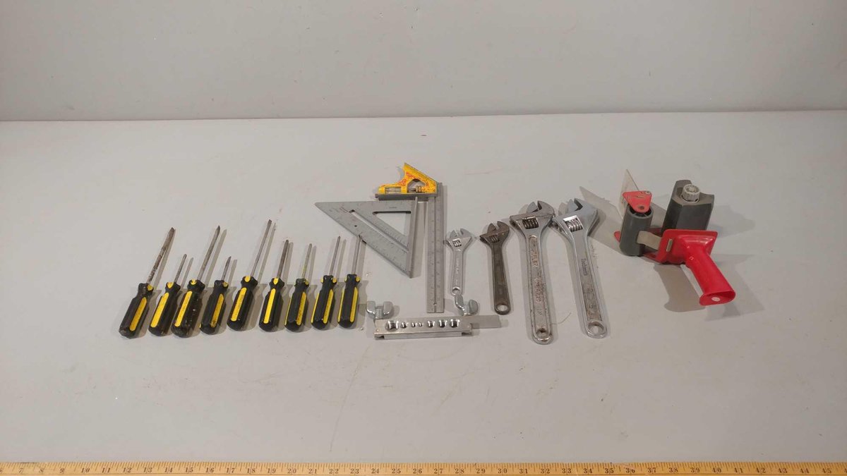 ASSORTMENT OF CRESCENT WRENCHES, SCREWDRIVERS, FRAMING SQUARE, AND OTHER MISC ITEMS