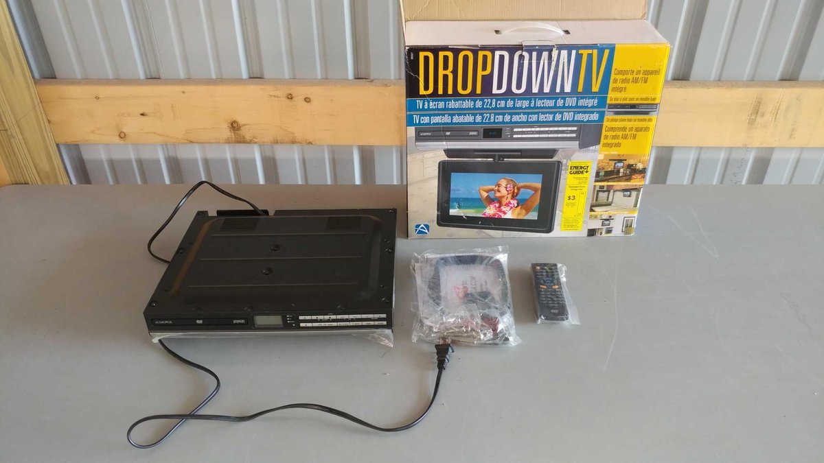 (I-66) DROPDOWN TV 9" WIDESCREEN LCD DROP DOWN TV WITH BUILT-IN DVD PLAYER (TURNS ON)
