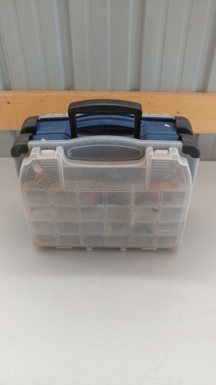 (I-71) PLANO TACKLE BOX WITH ASSORTMENT OF TERMINAL TACKLE, JIG HEADS, AND OTHER MISC FISHING TACKLE
