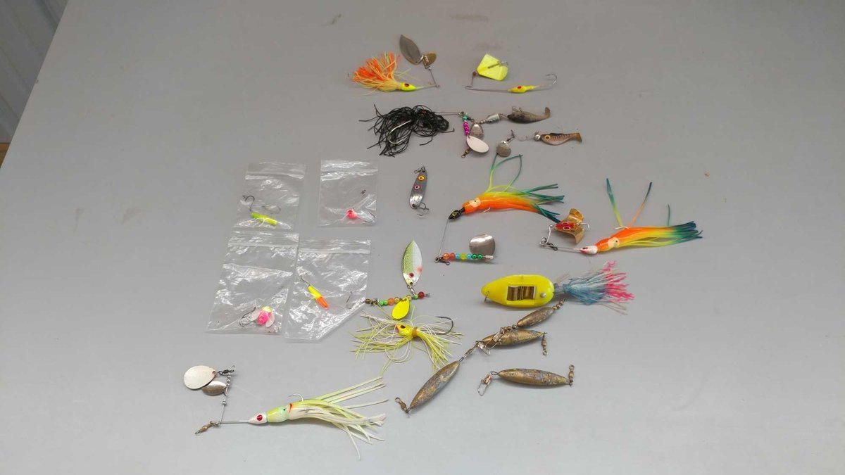 (I-72) ASSORTMENT OF BUZZBAITS, SPINNERBAITS, JIGS, SWIMBAITS, SPINNERS, AND OTHER FISHING TACKLE