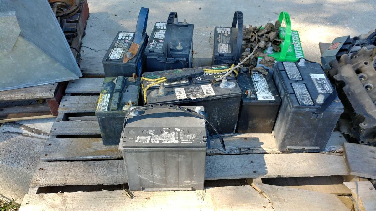 ASSORTMENT OF OLD BATTERIES