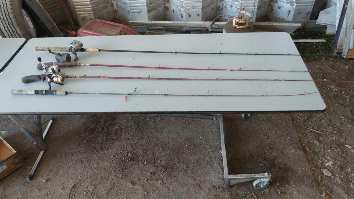 (4) FISHING RODS WITH REELS