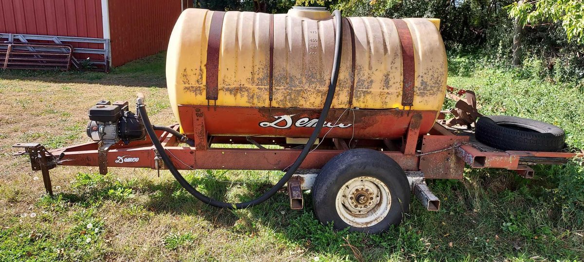 DEMCO TANK & PUMP ON SINGLE AXLE TRAILER