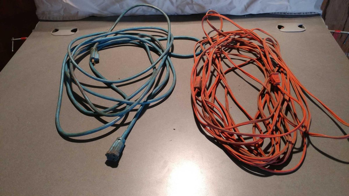 (1) BLUE EXTENSION CORD AND (1) ORANGE EXTENSION CORD