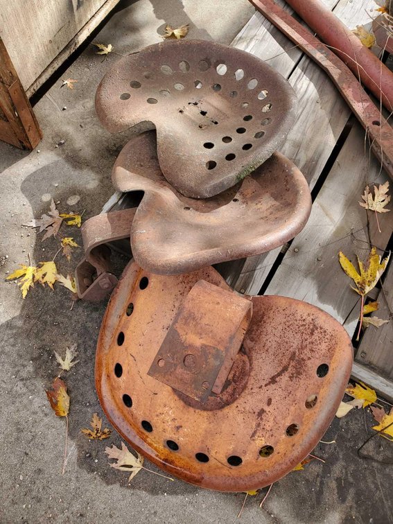 (I-25) (3) VINTAGE TRACTOR SEATS (FOR MORE INFO AND LOCATION CALL NEIL @ 612-804-4142)
