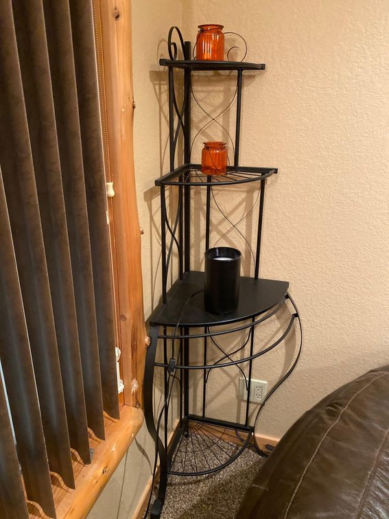 (A1-MANAGER) BLACK CORNER STAND W/ UPLIGHT AND MISC