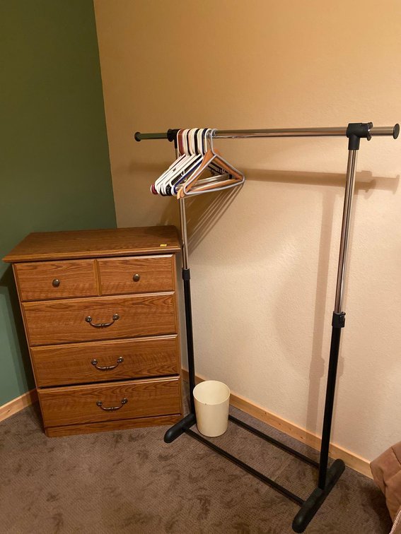  (A1-MANAGER) DRESSER 40"T X 31" W X 17"D & CLOTHES RACK 