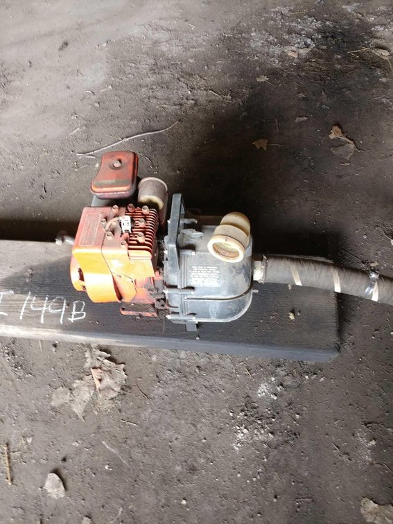 (I-149B) HOMELITE WATER PUMP ON WOOD BASE 