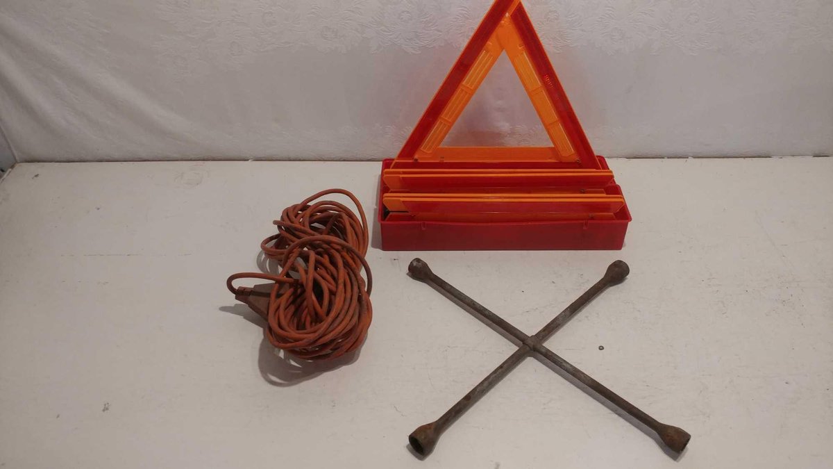 EMERGENCY TRIANGLES, TIRE IRON, AND EXTENSION CORD