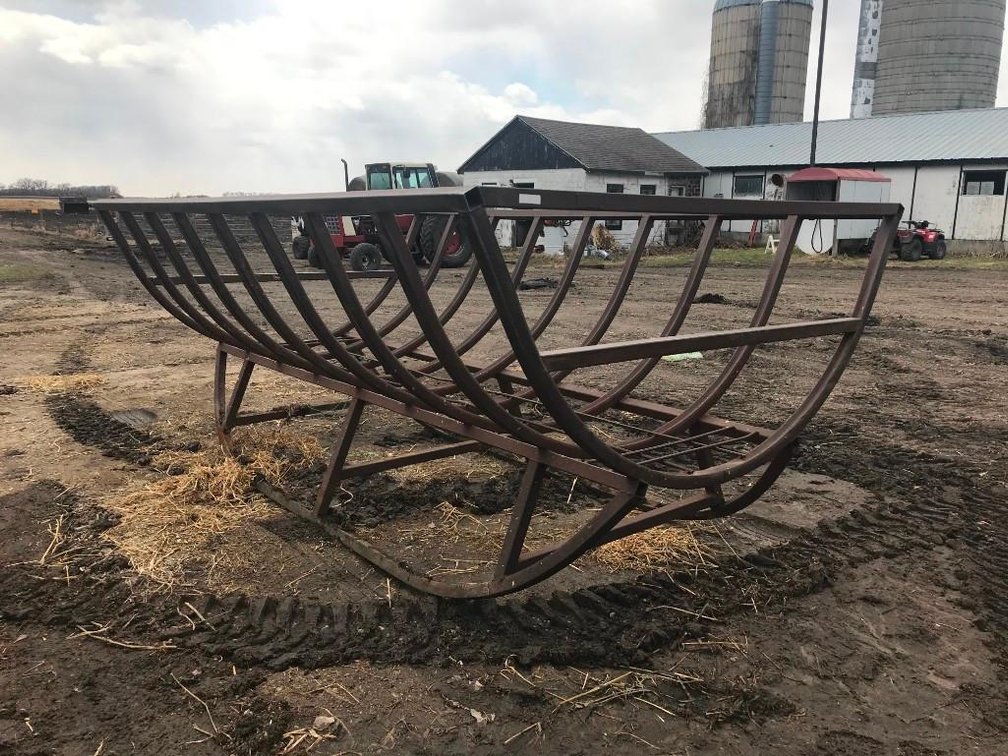 LARGE ROUND BALE FEEDER (FOR MORE INFO AND LOCATION CALL PETE @ 320-815-2619)