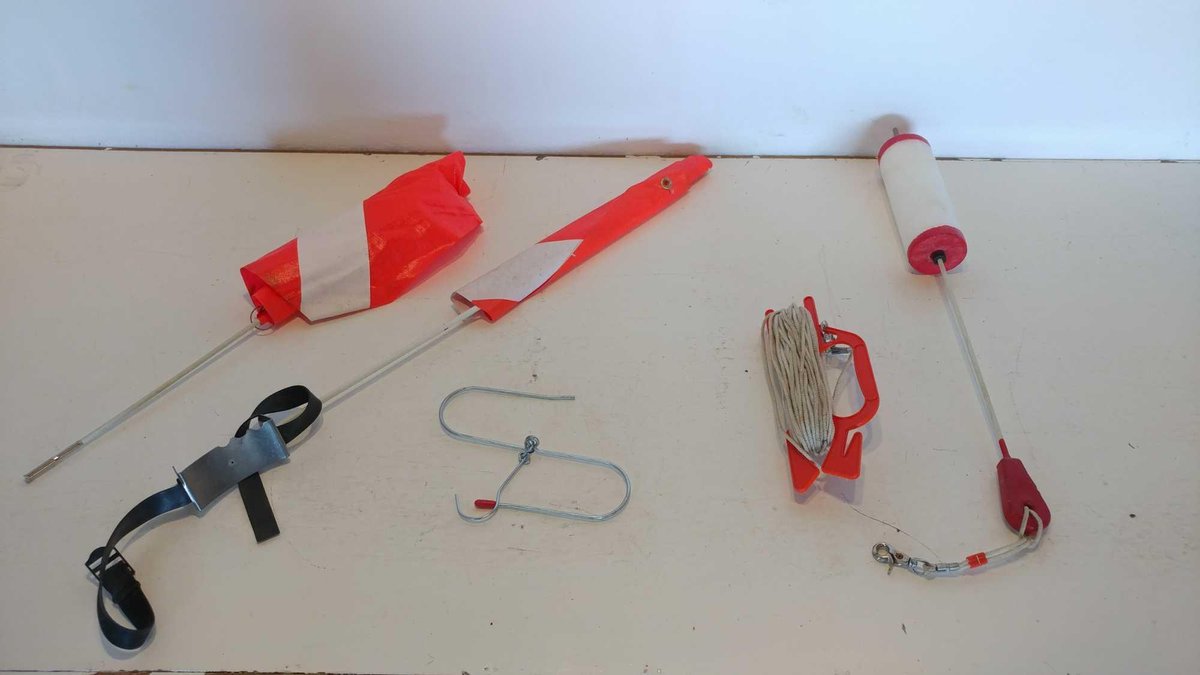 WEIGHTED BUOY, FLAGS AND ROPE  (ITEM AT ZIELSDORF AUCTIONS)