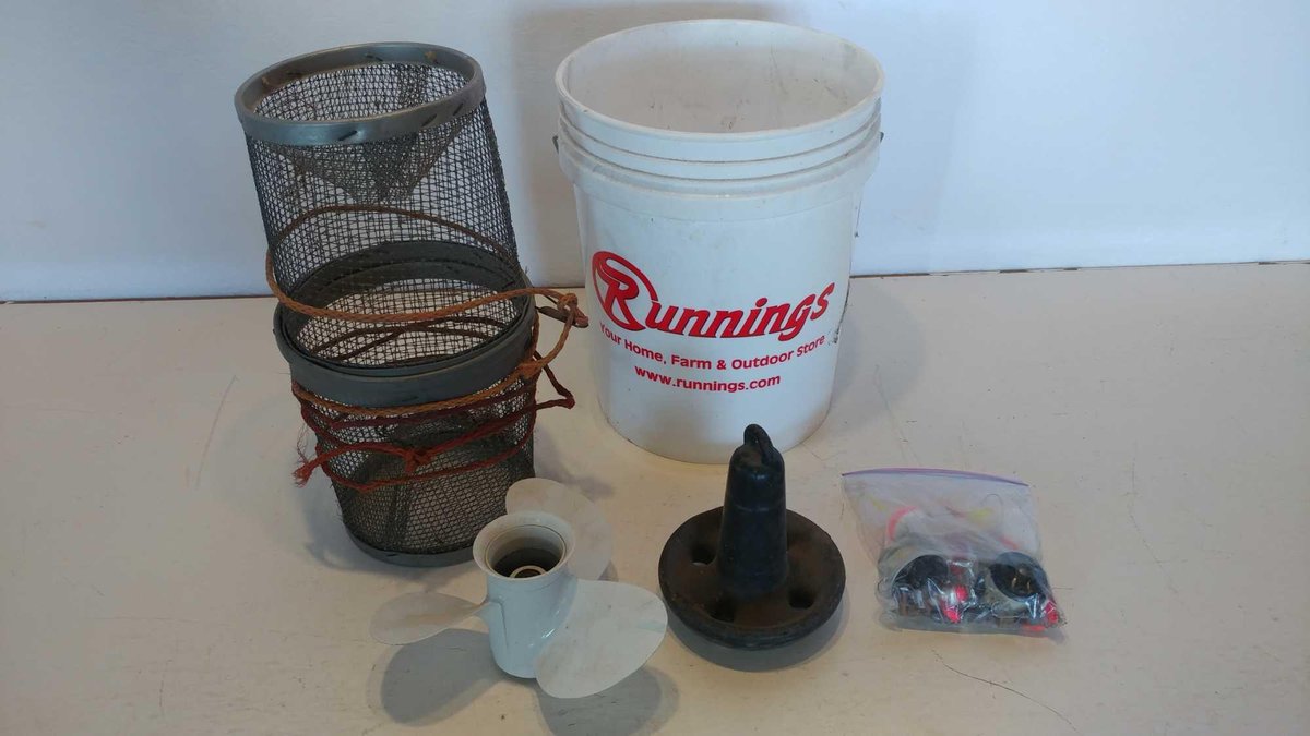 BOAT PROP, ANCOR, MINNOW BASKET, TACKLE, AND 5 GAL BUCKET