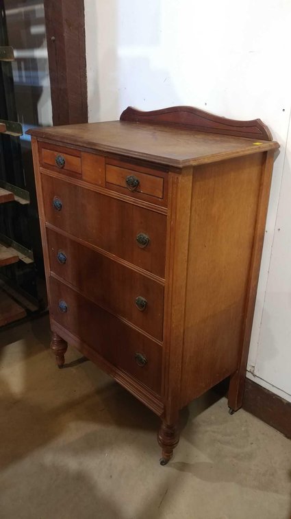 VINTAGE 4-DRAWER WOODEN DRESSER ON CASTER WHEELS