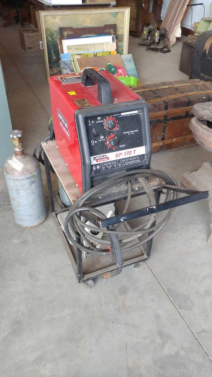 LINCOLN SP-170 T ARC WELDER W/CART, LEADS, AND SPARE ARGON (TANK IS OWNED)