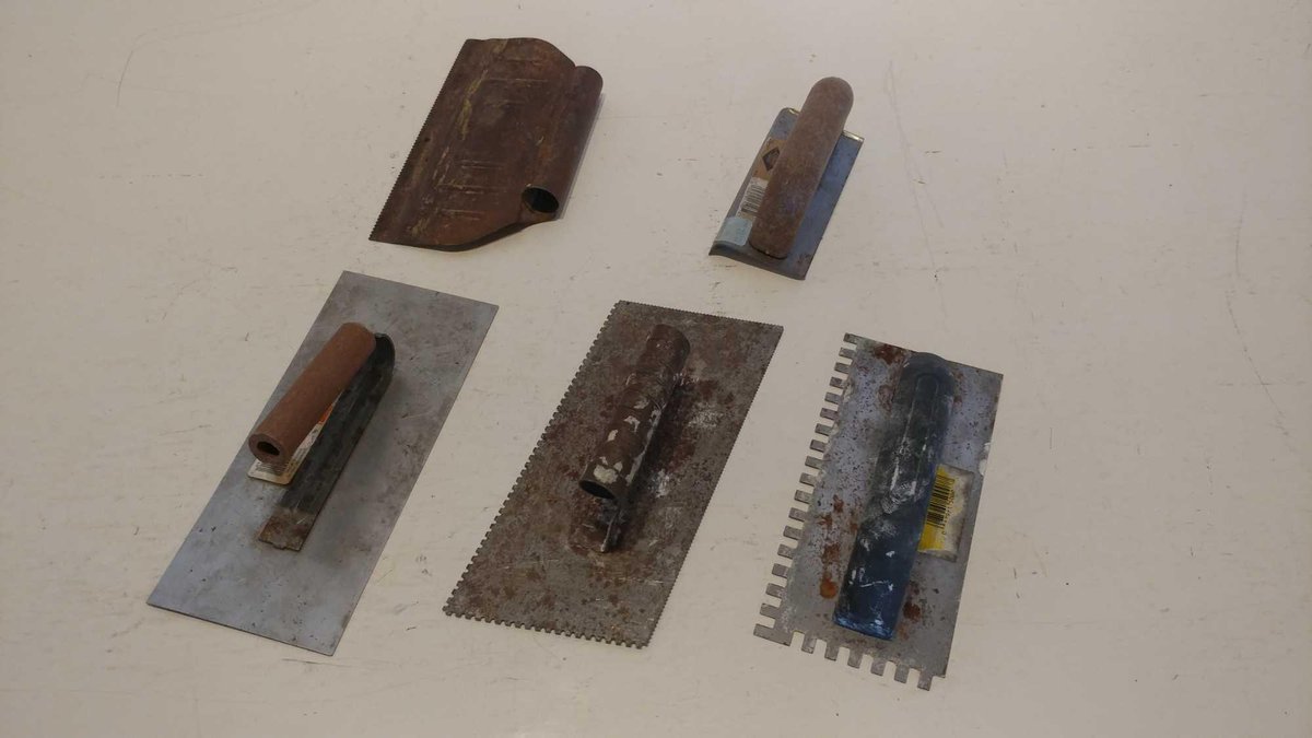 ASSORTMENT OF GROUTING TROWELS 