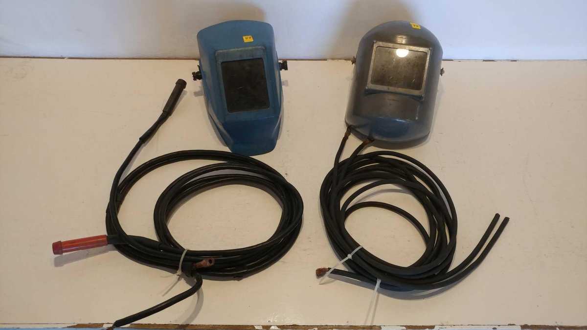 (2) WELDING HELMETS AND ASSORTMENT OF LEAD CABLES