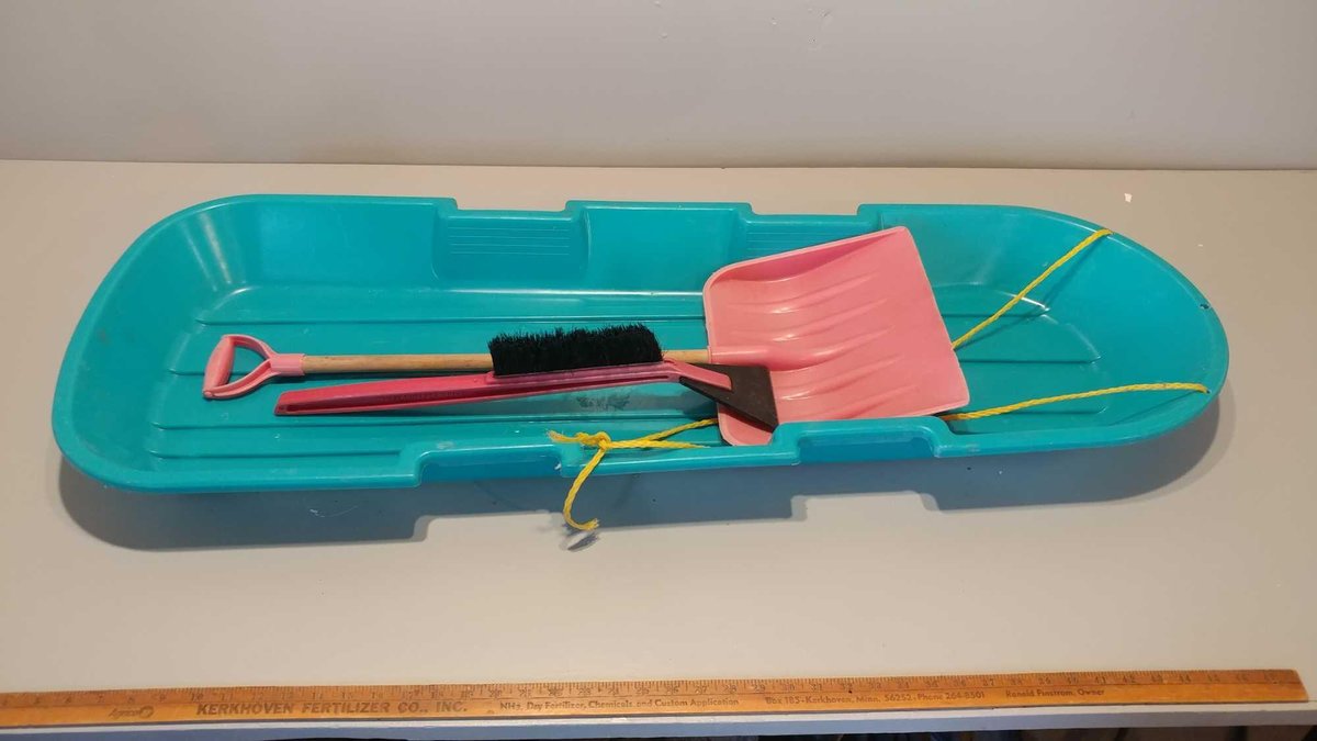 PLASTIC CHILDREN'S SLED and SNOW SHOVEL and ICE SCRAPER