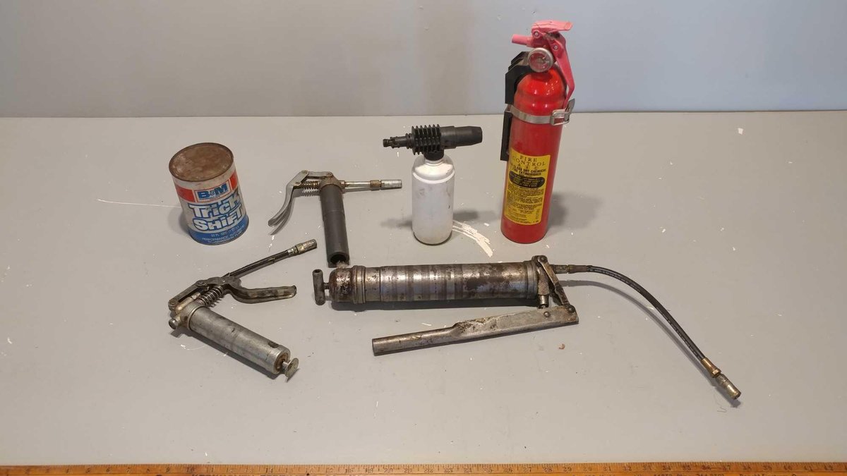 ASSORTMENT OF GREASE GUNS and FIRE EXTINGUISHER