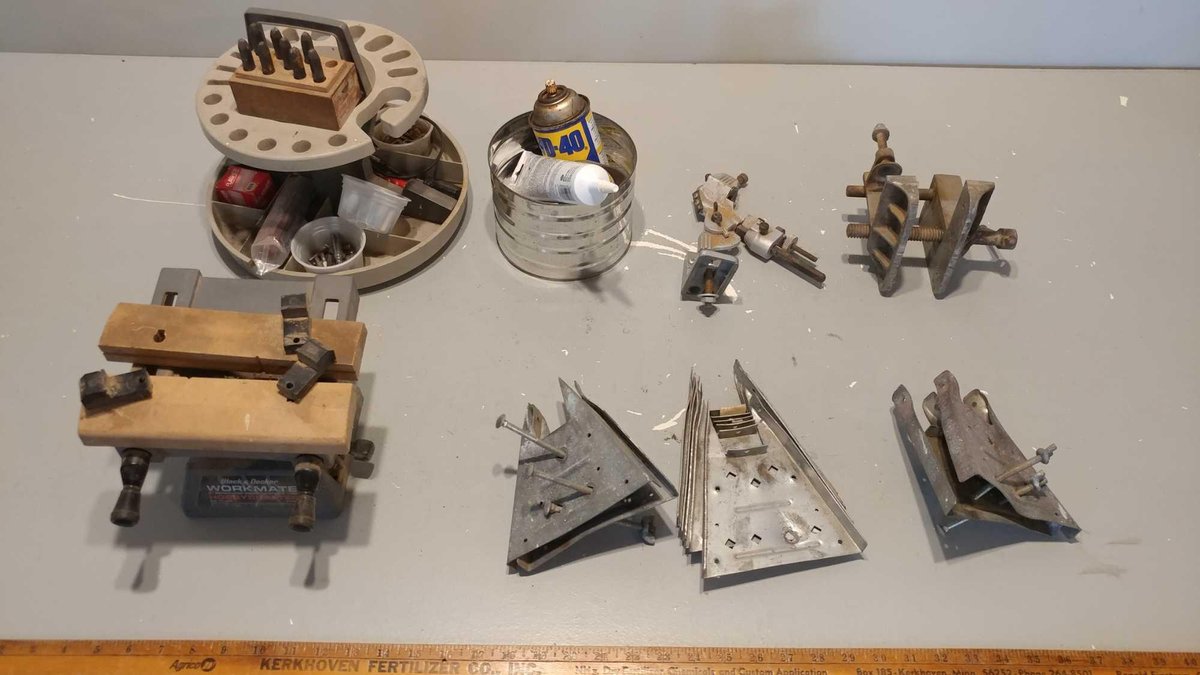 BLACK & DECKER 8" BENCH TOP VISE and TOOL CAROUSEL and SAW HORSE BRACKETS and MISC HARDWARE