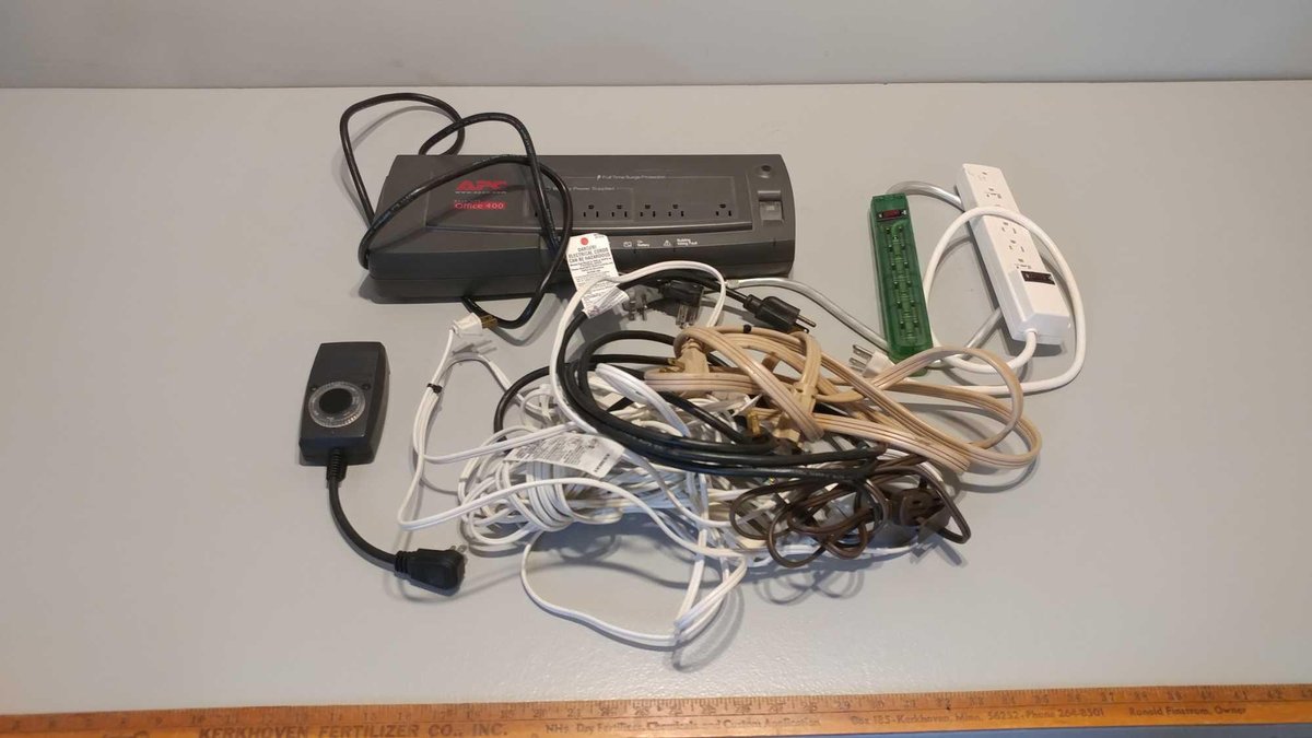 ASSORTMENT OF SURGE PROTECTORS, EXTENSION CORDS, and ELECTRIC TIMER