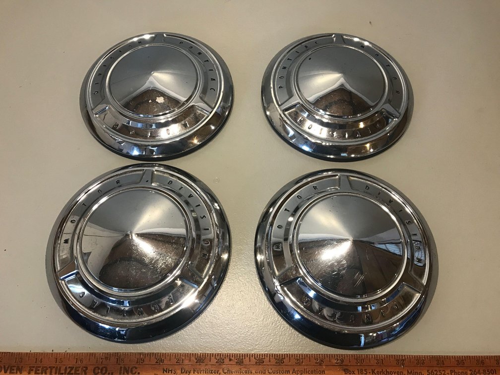(4) PONTIAC HUB CAPS (ITEM AT ZIELSDORF AUCTIONS)