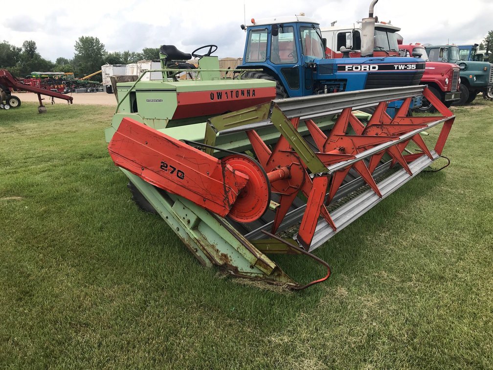 270 OWATONNA SELF PROPELLED  SWATHER 14’ HYDROSTATIC (ITEM AT ZIELSDORF AUCTIONS)