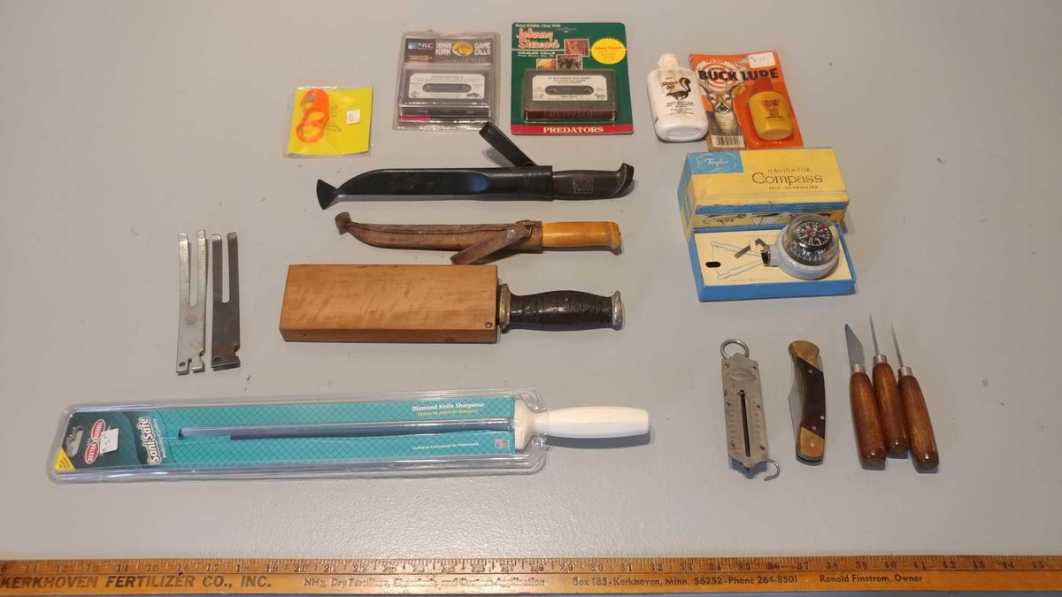 ASSORTED OUTDOOR KNIVES and ANIMAL CALL TAPES and BUCK SCENT and SKUNK OFF