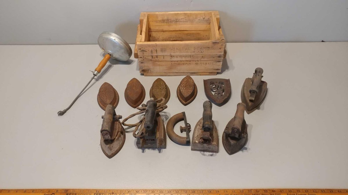LARGE ASSORTMENT OF ANTIQUE IRONS and TOILET SNAKE