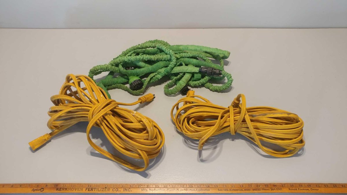 (2) 50' EXTENSION CORDS and 32' GARDEN HOSE