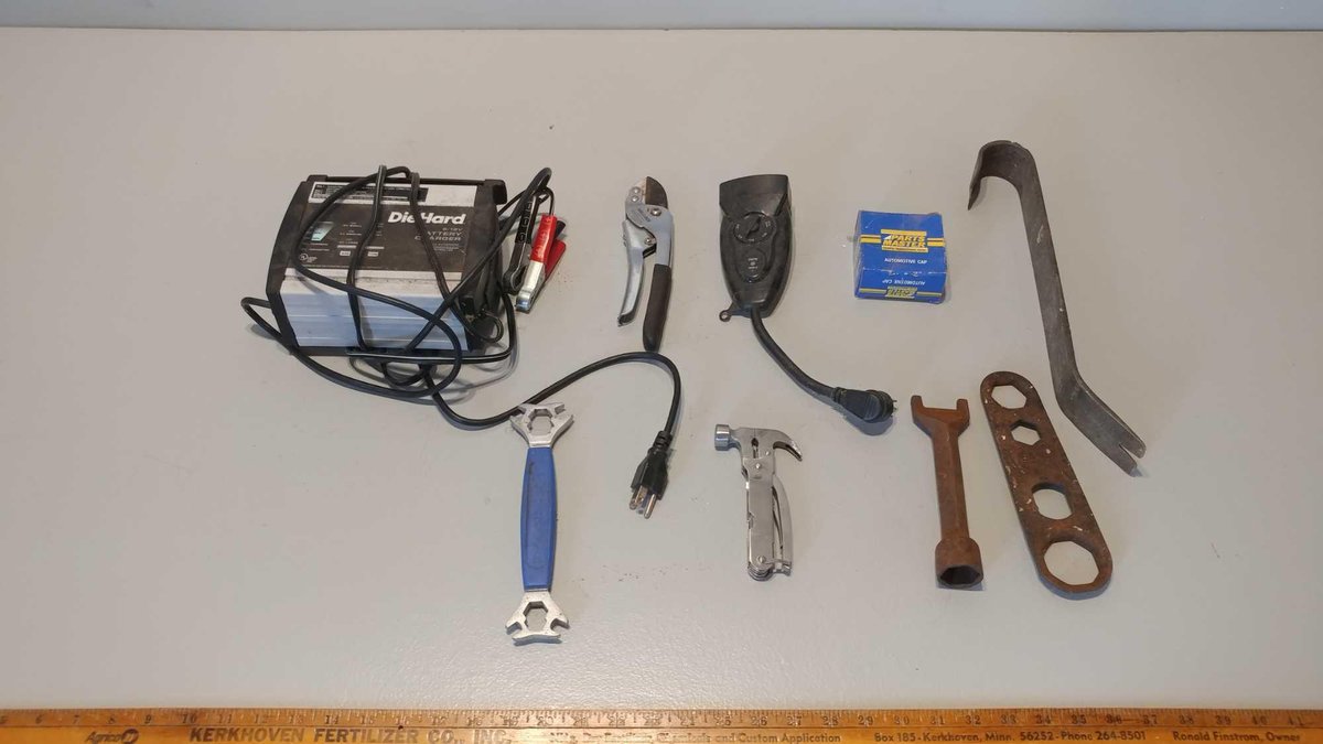 DIE HARD 6/12 V BATTERY CHARGER, PRY BAR, PRUNERS, ELECTRICAL TIMER, GAS CAP, AND MISC