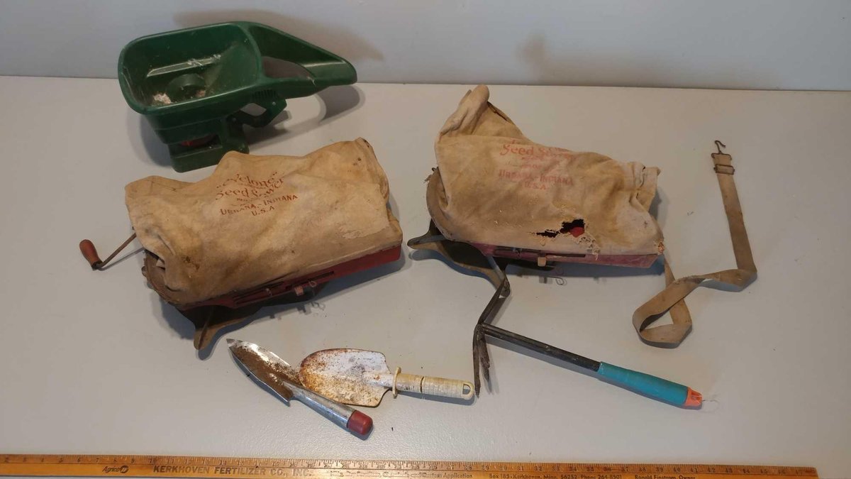 VINTAGE SEED SPREADERS AND GARDEN TOOLS
