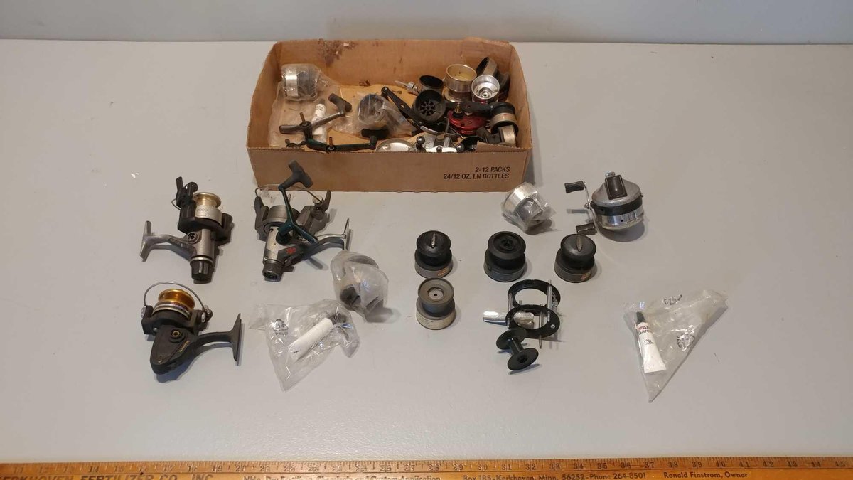 ASSORTMENT OF FISHING REELS & PARTS